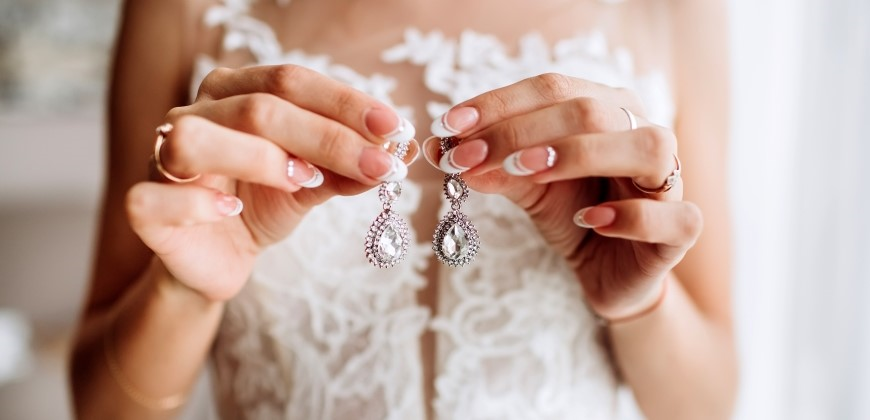 A bride choosing her jewelry