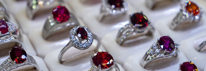 ruby rings in a display case