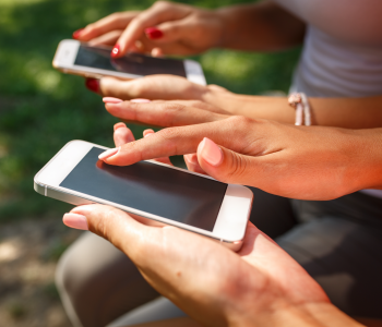 people using their phones