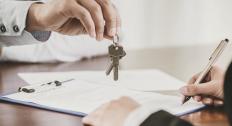 Woman signing a lease